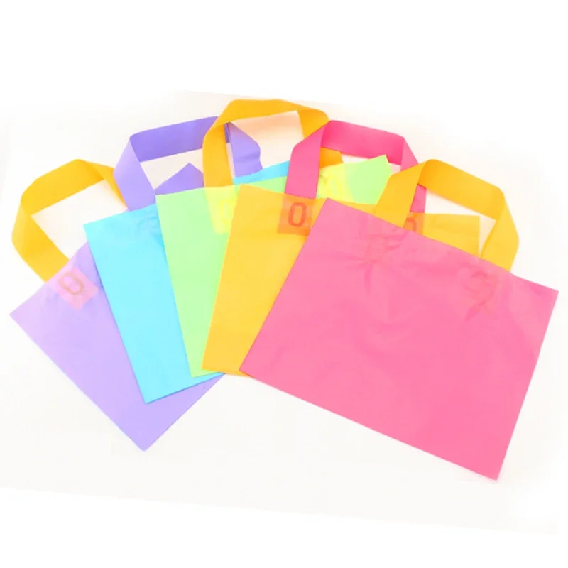 

50pcs/lot Plastic bag with handles thickened portable gift bag Shopping clothes shoes packaging bag Gift storage pouches
