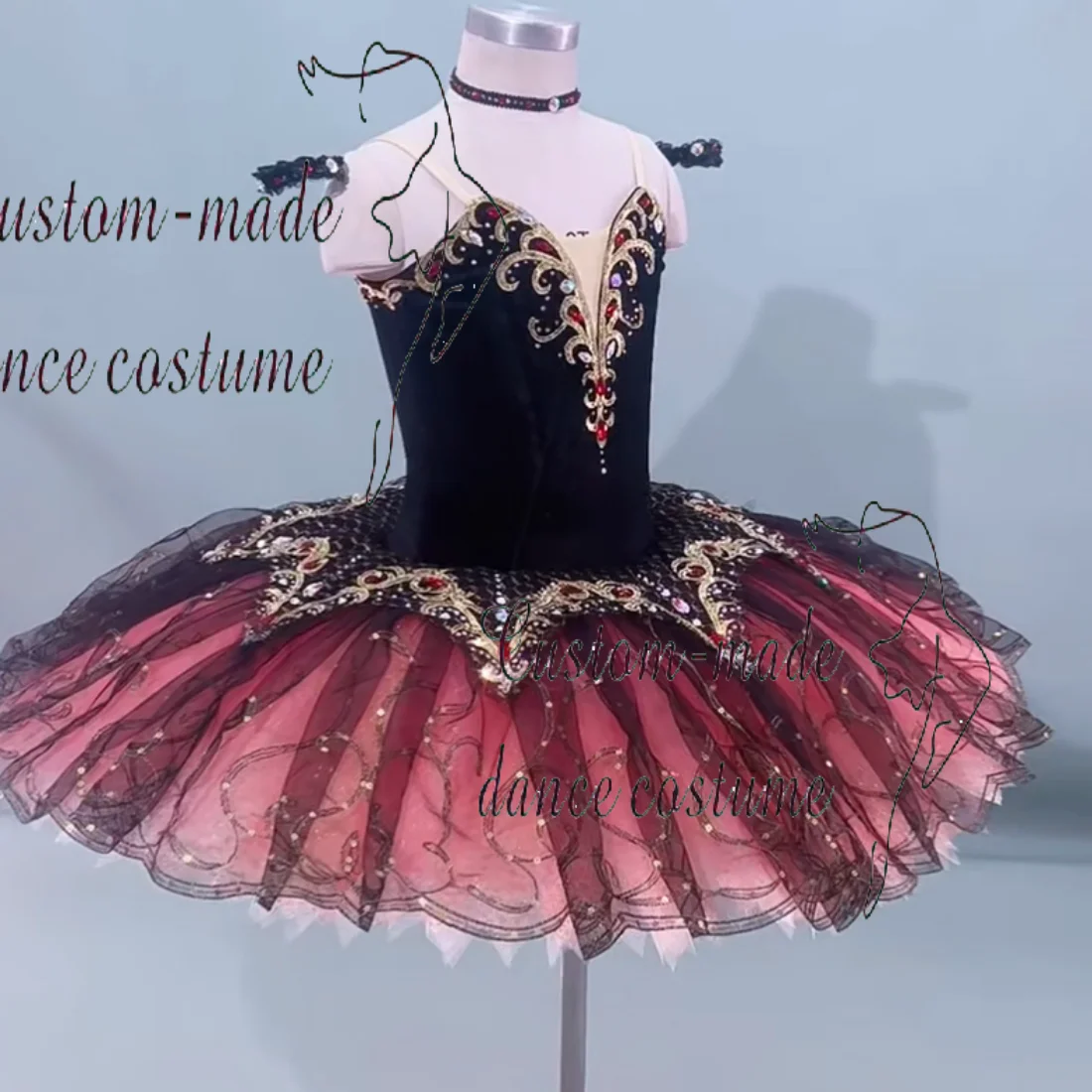 Tutú de ballet estilo español personalizado para variaciones de Don Quijote Kitri, corpiño de terciopelo negro con apliques dorados, falda degradada en rojo y rosa.