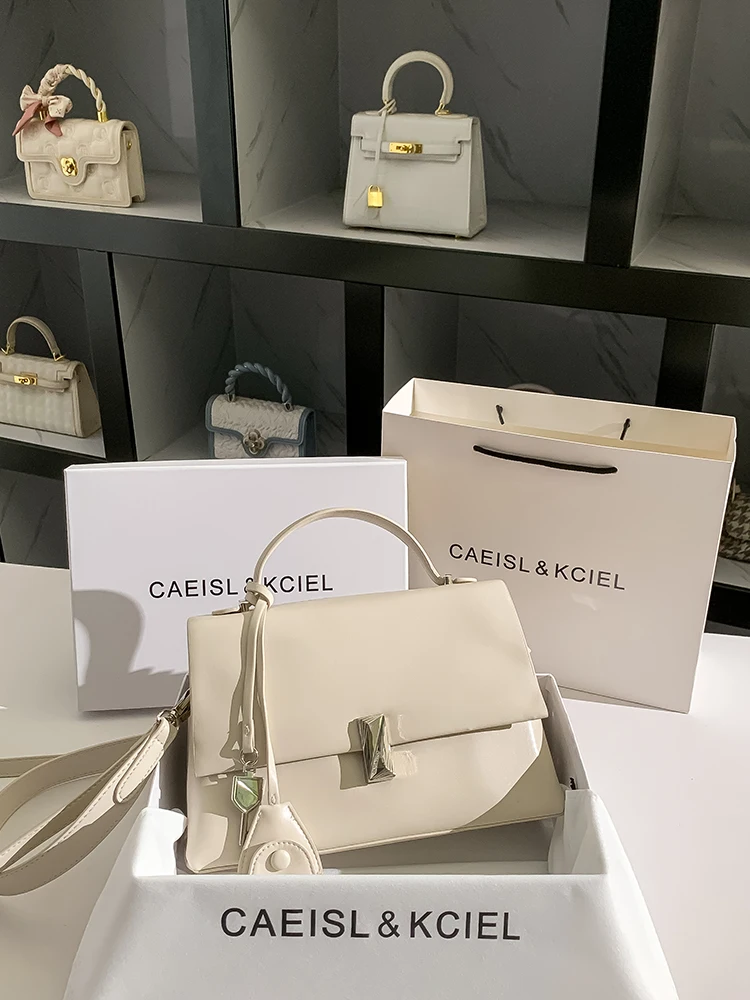 

CAEISLKCIEL Simple Commuter Tote Bag Women's Large Capaci Handbag New 2025 Faion Casual oulder Bag PU Leather
