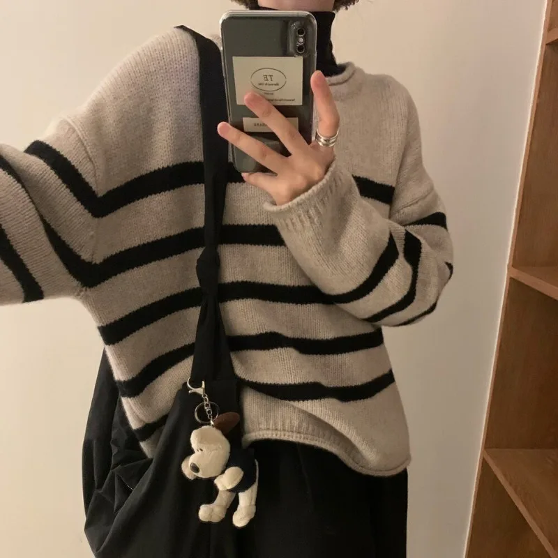 Casual Loose round neck striped knitted pullover sweater Winter women's Tops New Korean version rolled edge long sleeved sweater