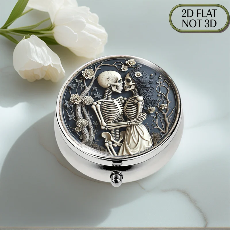This Portable Round Metal Pill Box Features a Beautifully Engraved Skull Couple Design, Making It an Ideal Gift for Pockets and Travel. It Features Compartments for Storing Small Items, Making It Perfect for Friends Who Value Health, and Is Also Suitable for Storing Medication, with a Flat Design.