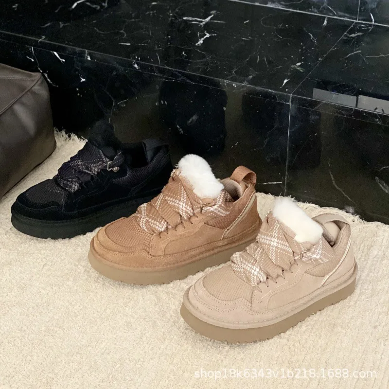 

The Cozy Shearling Mule Boot. Features a Chunky Lace-Up Sole For Ultimate Winter Warmth.