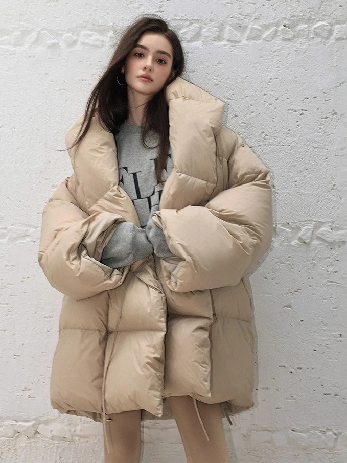 سترة نسائية شتوية جديدة لعام 2025 بياقة وشاح وياقة للركاب سترة كبيرة الحجم مقاومة للرياح