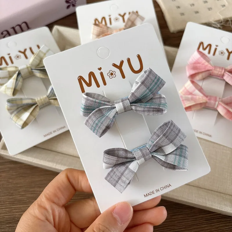 

2 шт./компл., милые кавайные заколки для школьниц в корейском стиле, тканевые заколки с бантом для челки, милые нескользящие универсальные аксессуары для волос