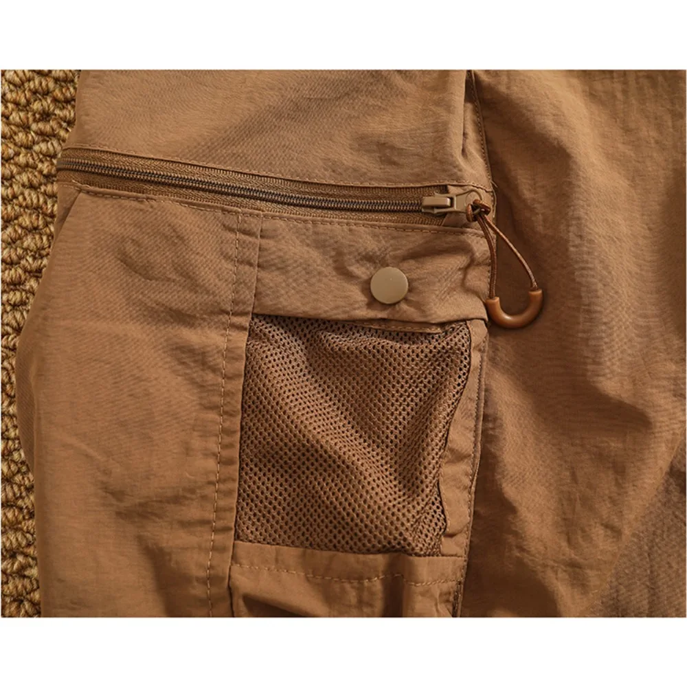 شورت سريع الجفاف للرجال بنمط جديد شورت عمل عصري وفضفاض للرجال صيفي متعدد الاستخدامات سروال خمس نقاط غير رسمي