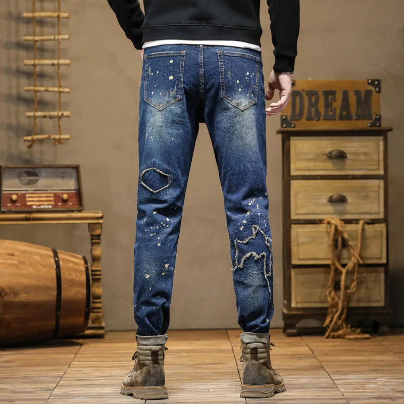 Street Design moto da uomo strappato ricamo Patch cuciture Splash-Ink Jeans pantaloni retrò Slim Fit alla moda da uomo