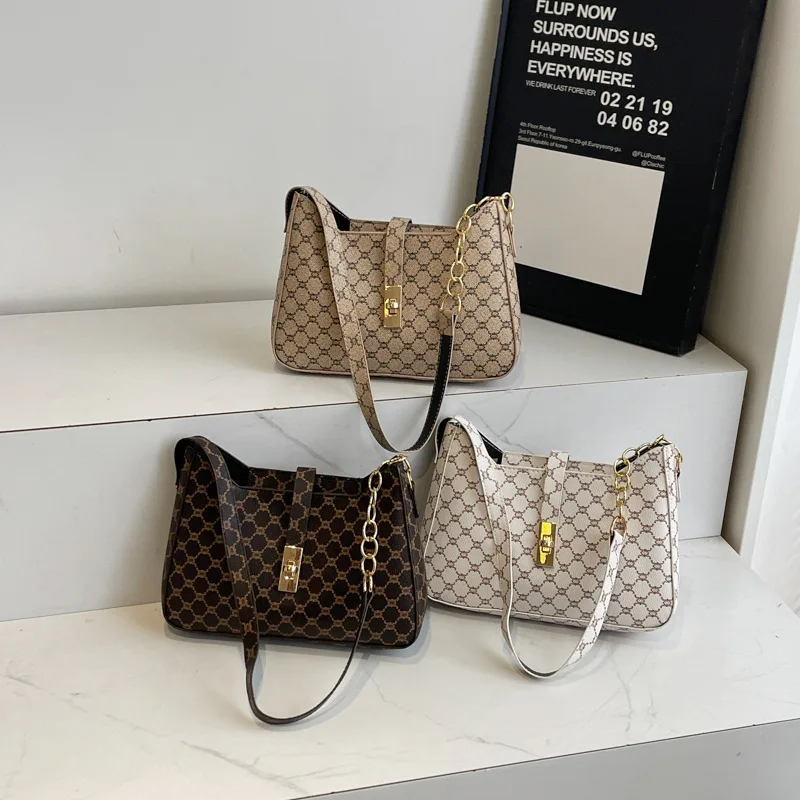 

Niche retro printed handheld and underarm bags, spring and summer new chain bags, single-shoulder bags, and handheld bags