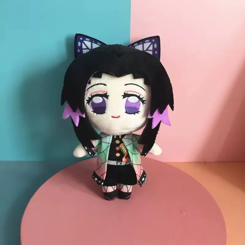 Kochou Shinobu giocattoli di peluche 20 cm bambini Douma bambola di pezza Natale Kamado Tanjirou peluche cuscino regali di compleanno decorazione delle ragazze