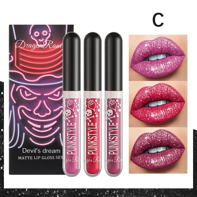 Lip gloss in a box of three, pearlescent lipstick in a non-stick cup, shiny purple and black lip gloss set