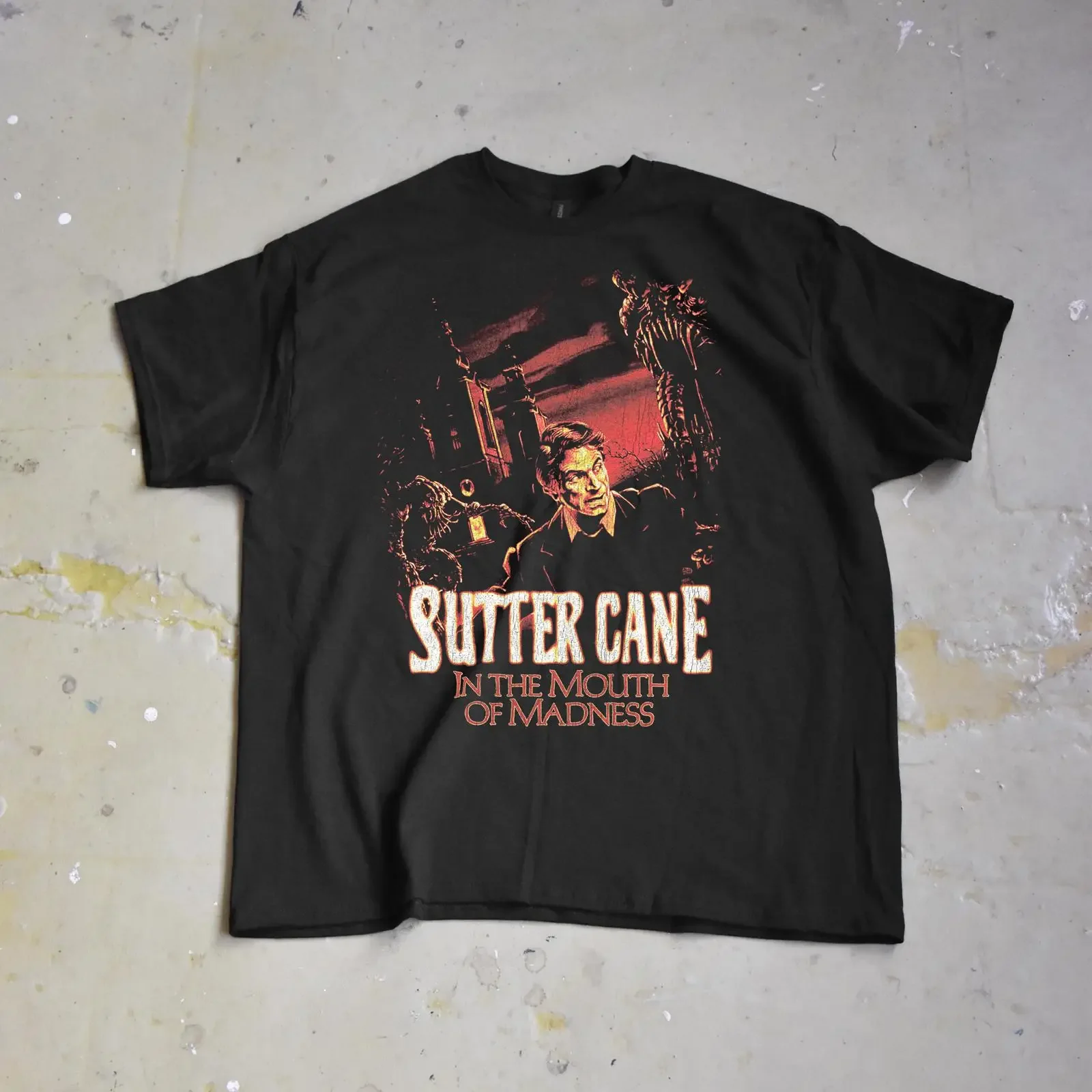 Camiseta In The Mouth Of Madness Sutter Cane Horror vintage lavada unisex versátil a la moda ligeramente gráfica transpirable