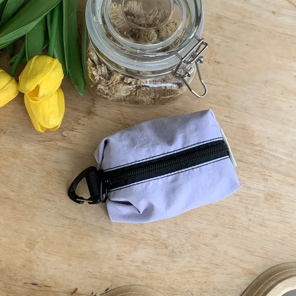 Kwadratowa, przenośna portmonetka z nylonu w stylu koreańskim, jednolita, zapinana na zamek, mała torba na drobiazgi, miękka kosmetyczka o dużej pojemności, etui na słuchawki.