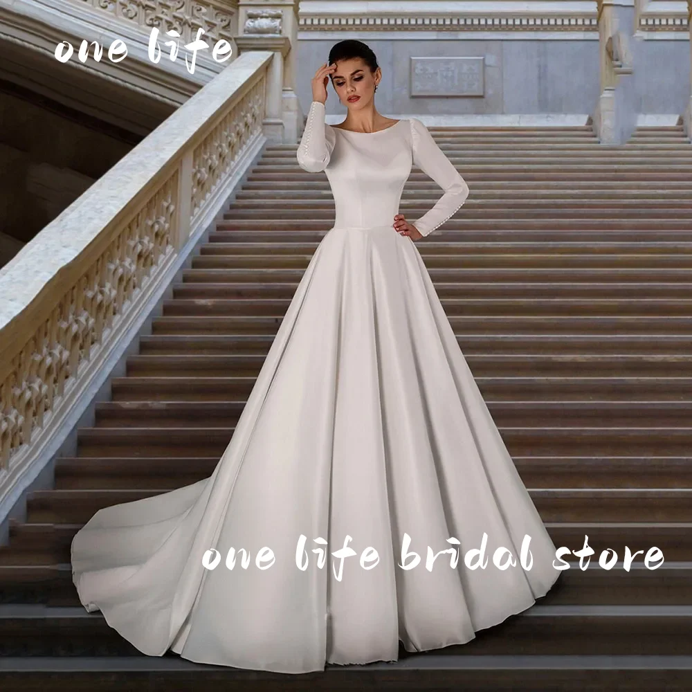 

Элегантное атласное свадебное платье OL с длинными рукавами на заказ, скромное платье для невесты, мусульманское платье с пуговицами, А-силуэт, женское свадебное платье