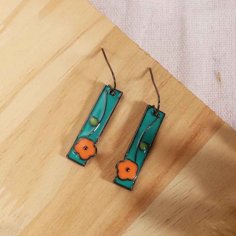 Kreative Blumen-Emaille-Anhänger-Ohrringe Himmelblau Orange Florale Lange Ohrringe Täglicher Urlaubs-Styling Niedlicher Schmuck Geschenke