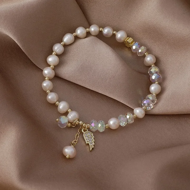 ALLNEWME Cute  Gold Plated Brass Baroque Freshwater Pearl Crystal Cross Wings Strand Beaded Bracelets for Women Birthday Gift