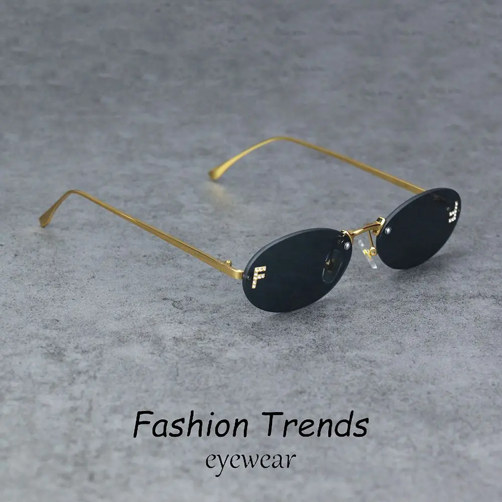 Oculos-de-sol-sem-aro-com-decoracao-de-diamante-para-mulheres-marca-de-luxo-armacao-de-metal-pequenos-oculos-de-sol-ovais-unsiex-elegantes-uv400