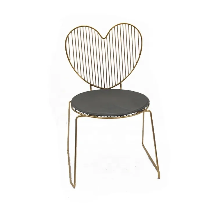 

Heart-shaped backrest hotel dining chair gold metal coin dining chair with boroque insert