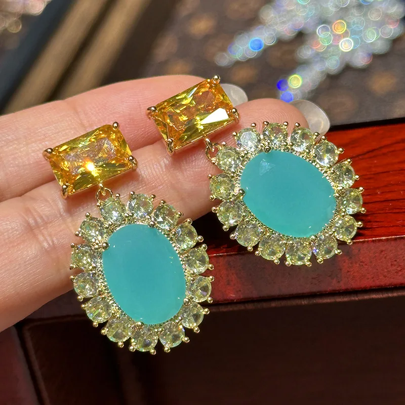 

Elegant Oval Drop Earrings with Yellow and Blue Crystals Golden Setting Ideal for Formal Events Evening Wear Jewelry for Women