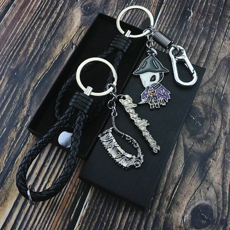 Llavero de Cuero Bloodborne, Llavero de Evelyn y Saw, Llaveros para Hombre, Accesorios de Juego, Anillo para Llaves de Coche, Joyería, Llaveros