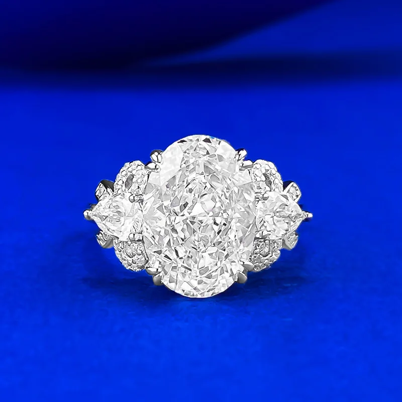 

New European and American S925 Silver Imported High Carbon Diamond 9 * 13 Pigeon Egg Bow Ring Cross border Edition