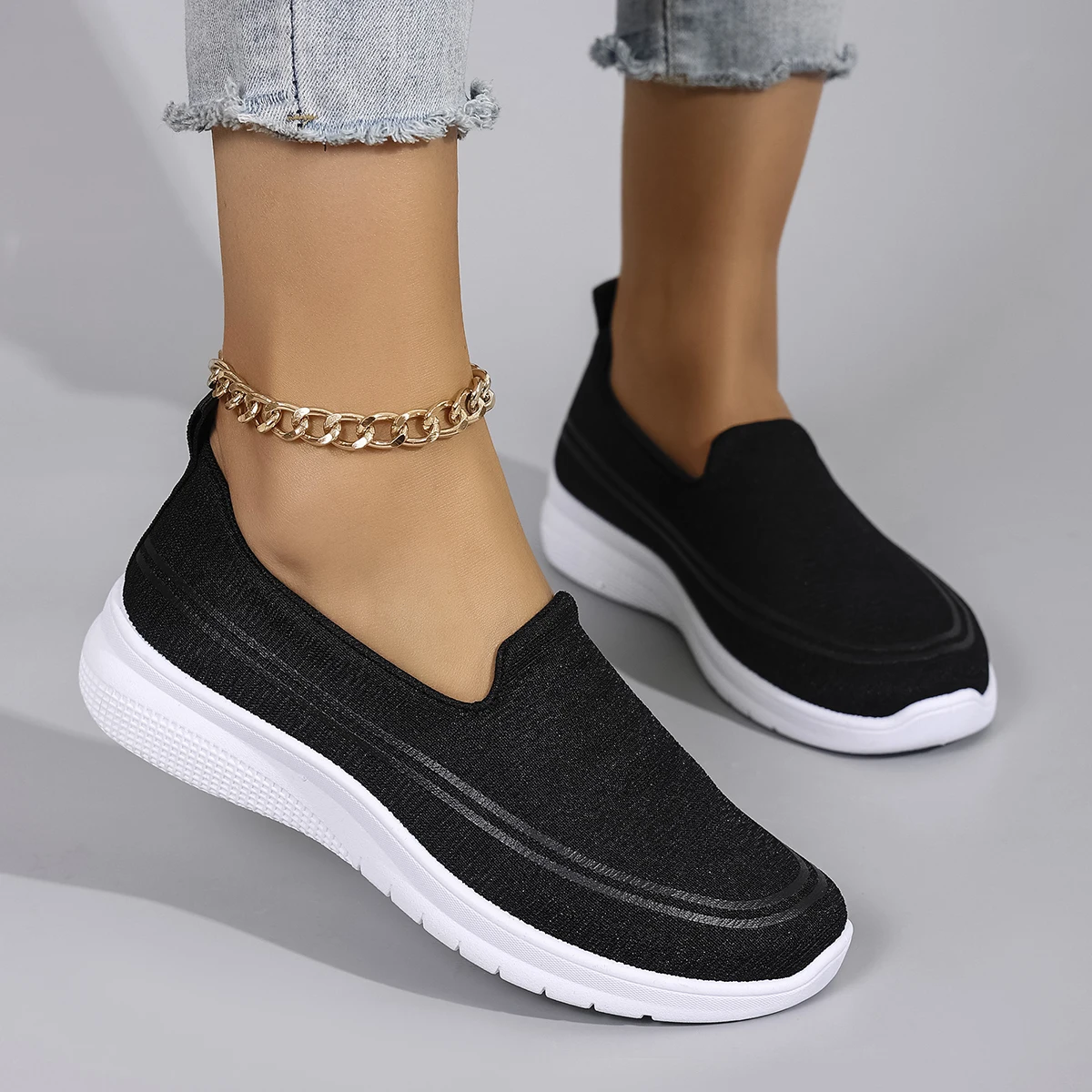 รองเท้าลําลองสตรีฤดูใบไม้ผลิที่สะดวกสบาย ระบายอากาศได้ น้ําหนักเบา และทนต่อการสึกหรอพร้อมพื้นรองเท้านุ่มสําหรับคนขี้เกียจในการเหยียบ