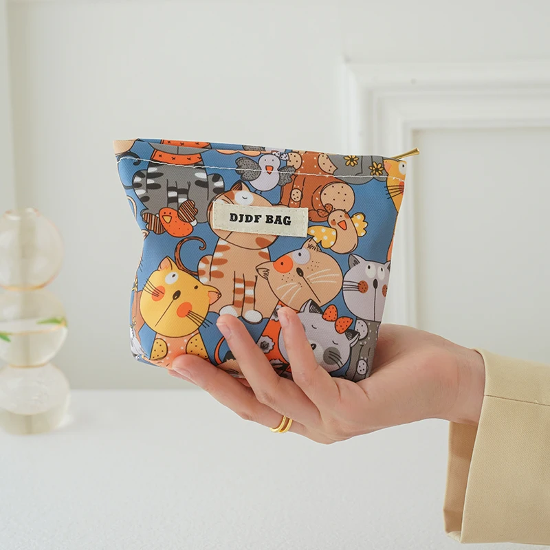 Cosmetic bag small cartoon cat PVC waterproof portable coin purse cosmetics lipstick cushion storage bag commuter clutch makeup