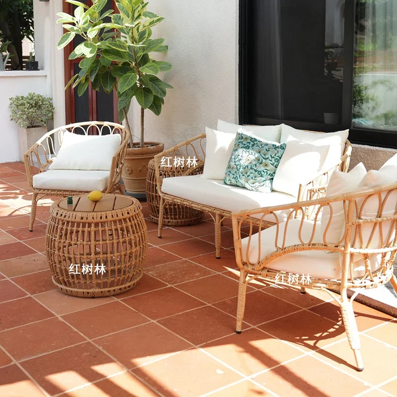 Customized net celebrity outdoor inn balcony courtyard terrace tea table chair combination leisure rattan woven chair