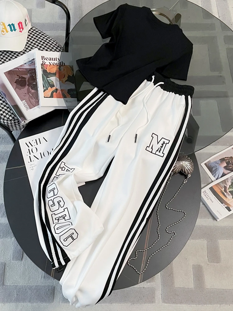 2025 New loose and slimming Korean version black letter short sleeved top, summer casual sports white pants two-piece set S-2XL