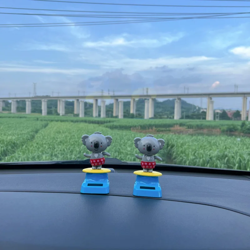 Popularidade quente de novos brinquedos solares dos desenhos animados bonito coala dança solar balançando cabeça brinquedo casa decoração do carro presente criativo
