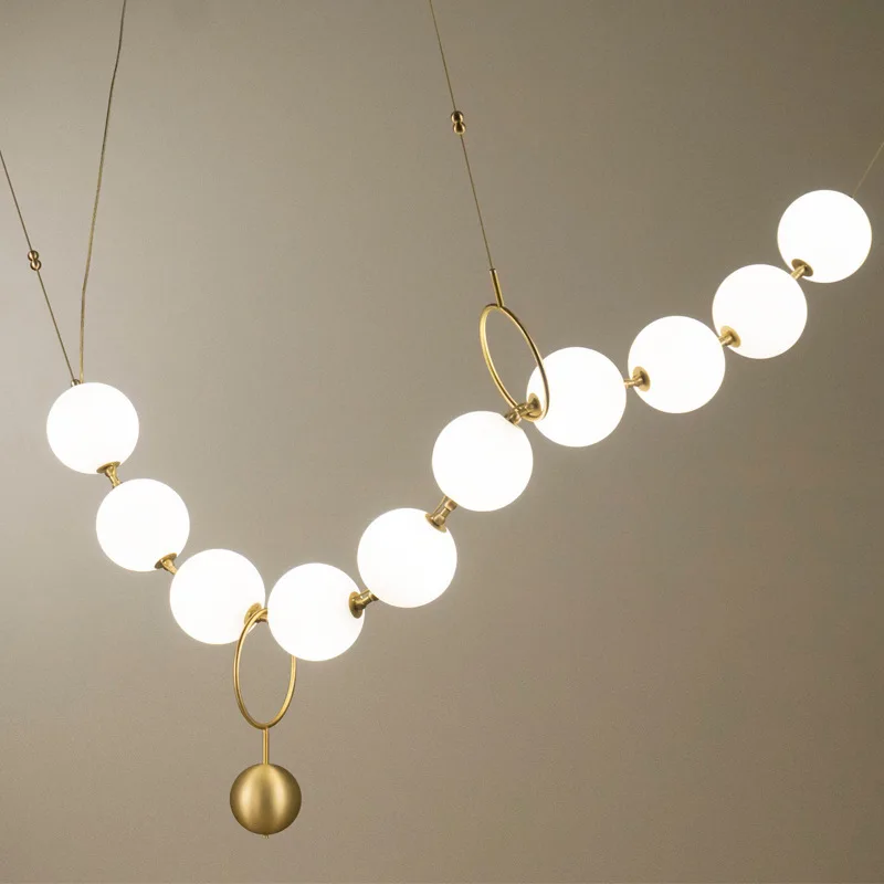 Nordic Post-modern Luxury Designer Creative Pearl Necklace Pendant Lamp Strip Background Wall Bedside Magic Bean Lamp