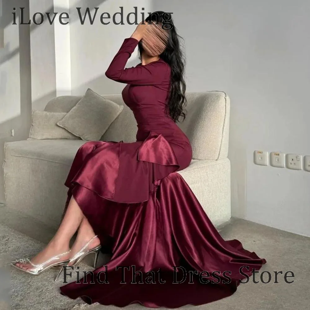 ชุดราตรีทรงเข้ารูปคอโอแบบสั่งตัด ดีไซน์ทันสมัย แต่งระบายช่วงหลัง เปิดหลัง ยาวกรอมพื้น พร้อมแขนยาว เหมาะสำหรับงานพรอมหรืองานเลี้ยงตอนเย็น