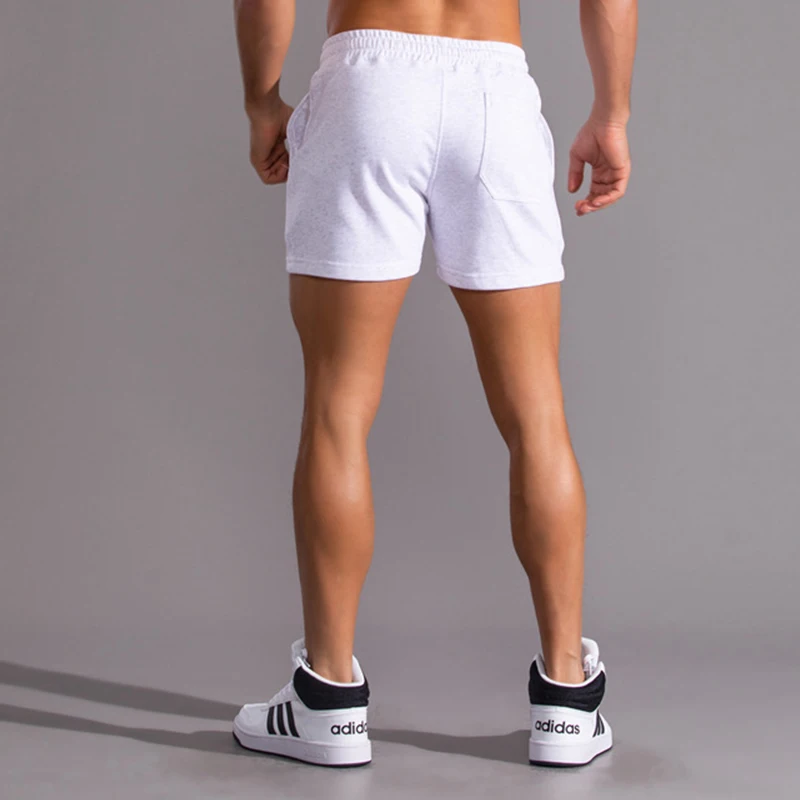 Pantalones cortos de algodón para correr para hombre, ropa interior deportiva informal para gimnasio, Fitness, entrenamiento de Yoga, Boxers sueltos, pantalones súper cortos para el sudor