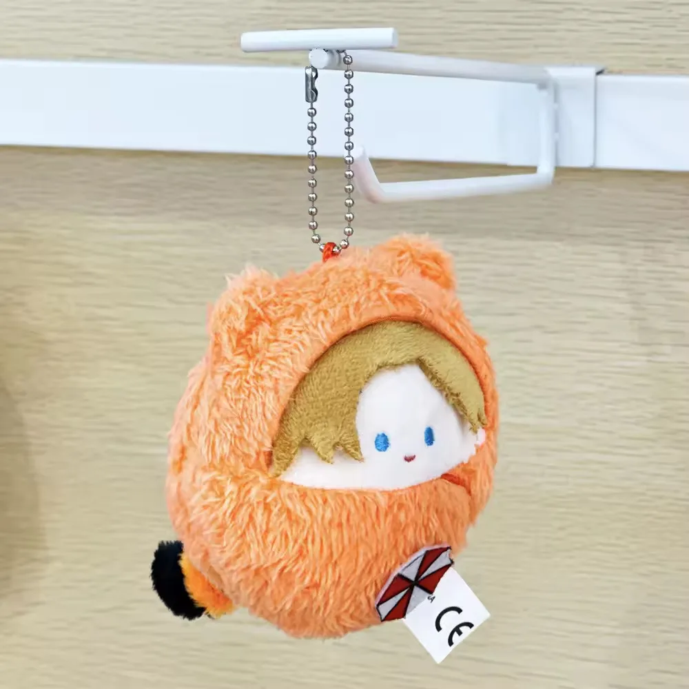 جديد 10 سنتيمتر Biohazard المقيم الشر ليون S. كينيدي ألعاب من القطيفة لطيف على ظهره قلادة محشوة المفاتيح دمية الاطفال هدايا عيد الميلاد