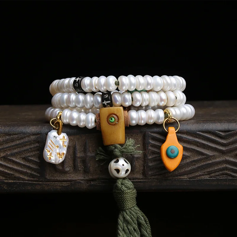 108-bead Tibetan-style antique rosary: agate, spiral beads, re-formed bone, ‘A-dai’ and ‘San-tong’ natural pearls