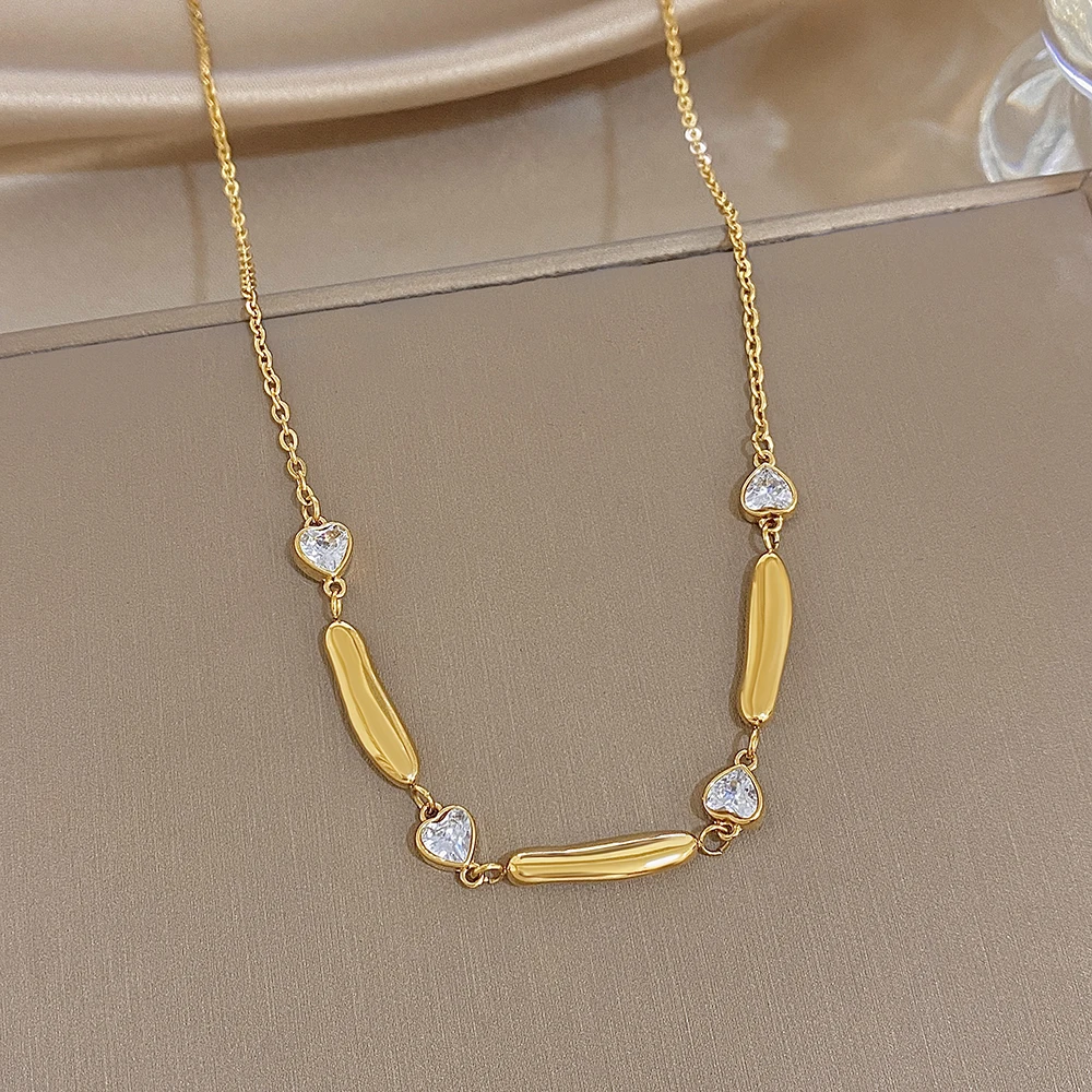 AENSOA Damen Halskette aus Edelstahl in Goldfarbe, lange, zierliche Halskette mit Herz-Zirkon-Verzierung, klassisches Schmuckstück für Partys, Geschenk. – Detail 5