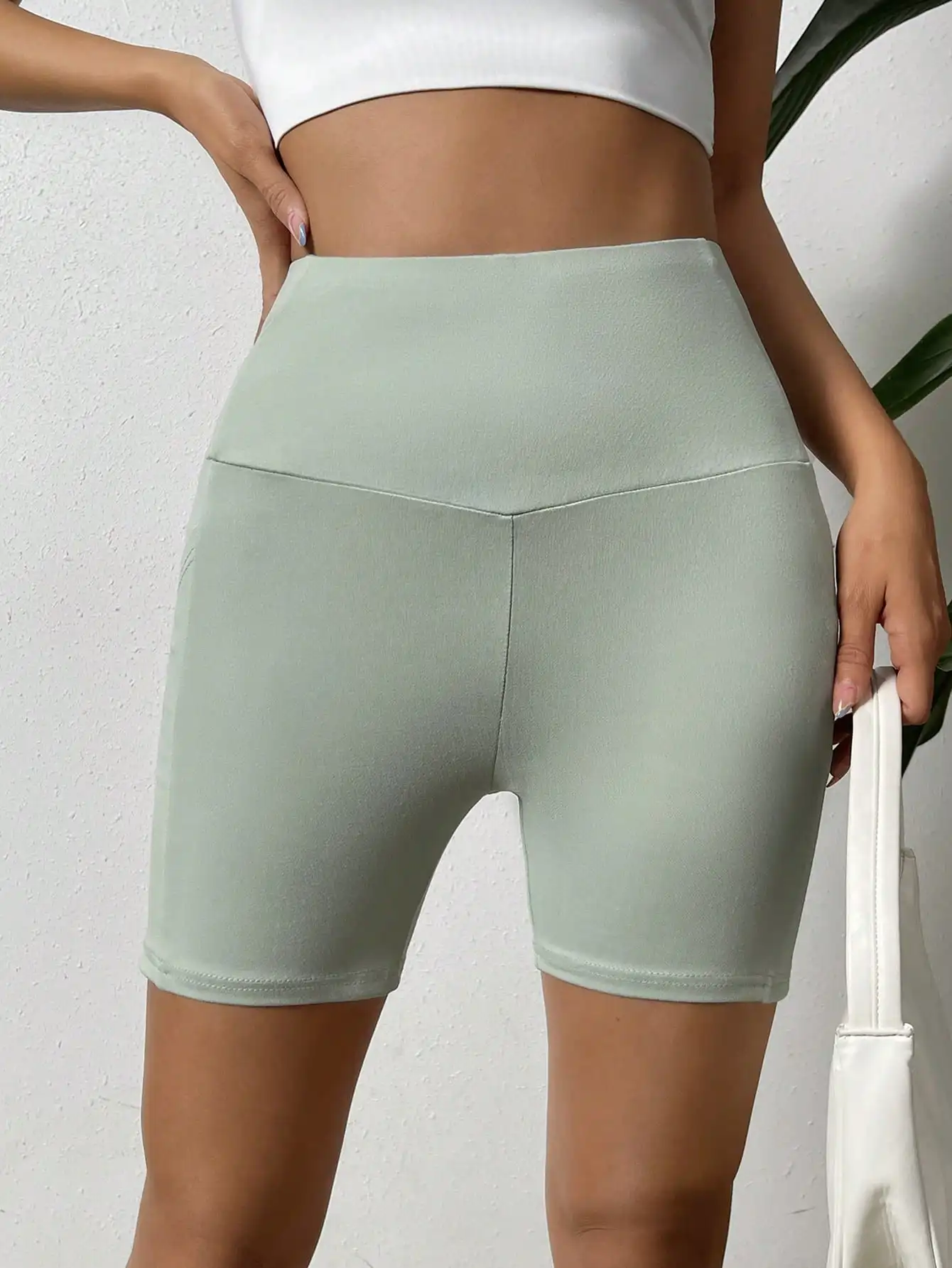 Nice moda casual malha esportes alta bolso elástico primavera e verão leggings curtos femininos