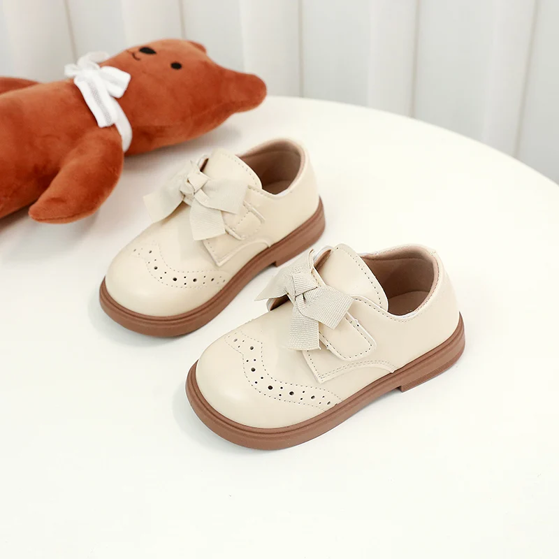 สาวรองเท้าหนังหวาน Bows เด็กเจ้าหญิงรองเท้า Retro สไตล์อังกฤษ 2025 เด็กใหม่แบนรองเท้า Soild สีลื่น
