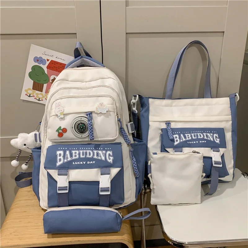2025 Set di borse da scuola con manico morbido in nylon per la stagione del ritorno a scuola di alta qualità, combinazione di zaini casual con struttura esterna con cerniera solida