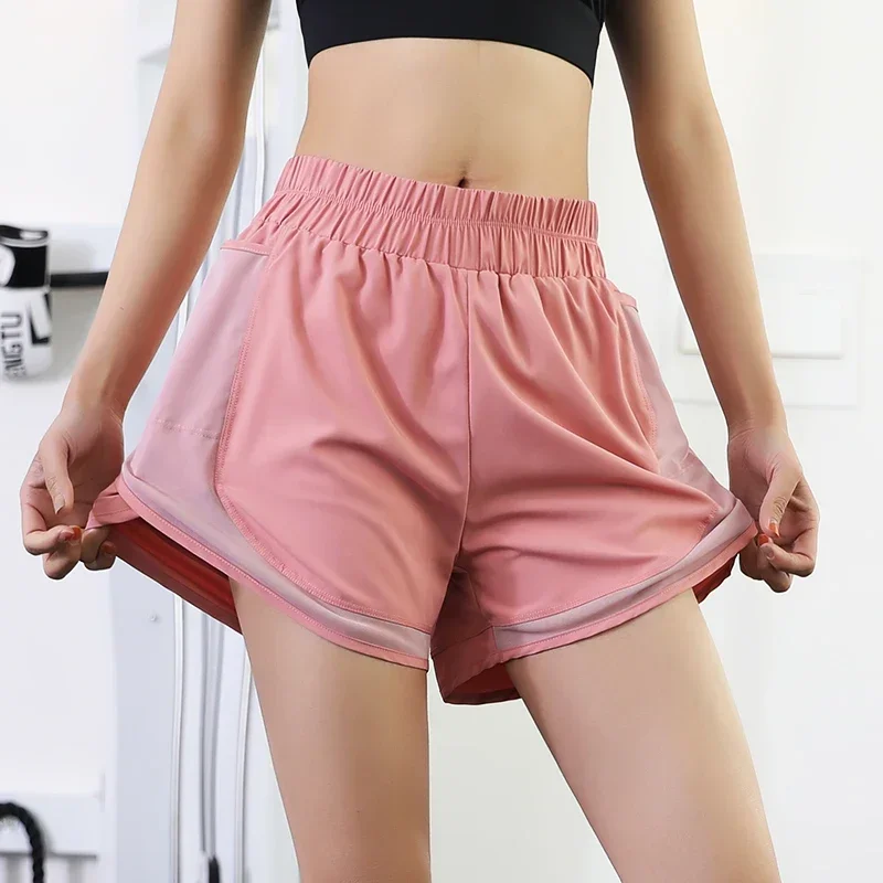 Quick drying shorts anti naked running training outdoor vacation two pieces of net fitness pocket women's sports shorts