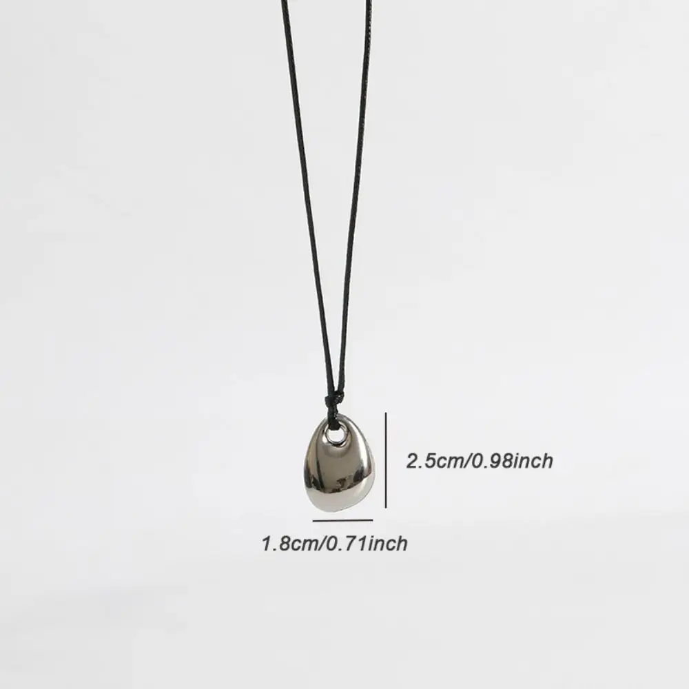 Collar de cuerda negra de aleación de moda, colgante de frijol, cadena larga ajustable para suéter, joyería de moda dorada/plateada, cadenas para clavícula