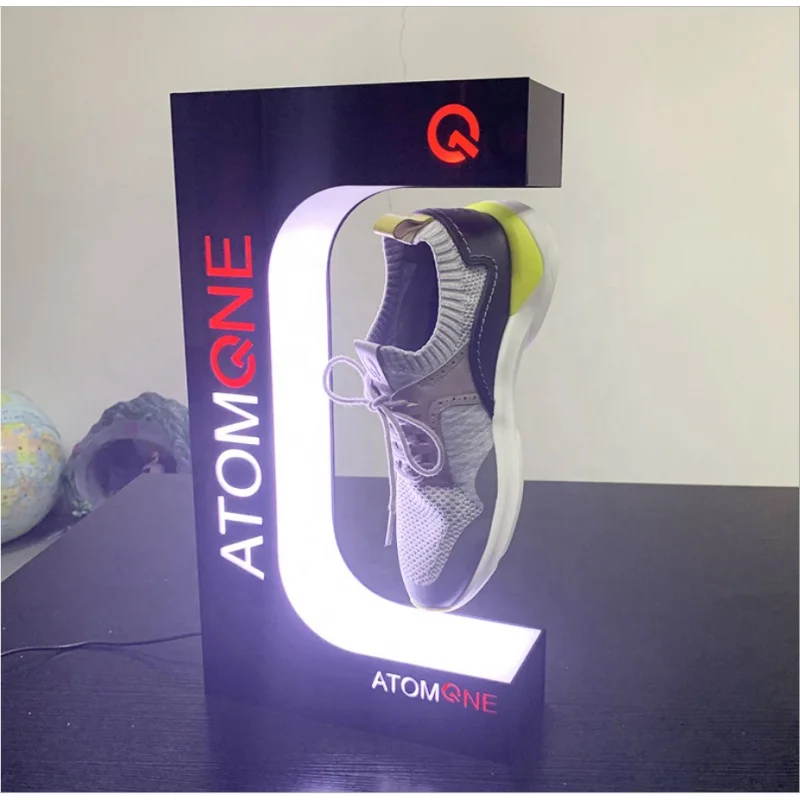 

Custom, OUJIA Single Shoe Store Shop Rotating Display Stands Hanging Holder Anti Magnetic Shoe Stand