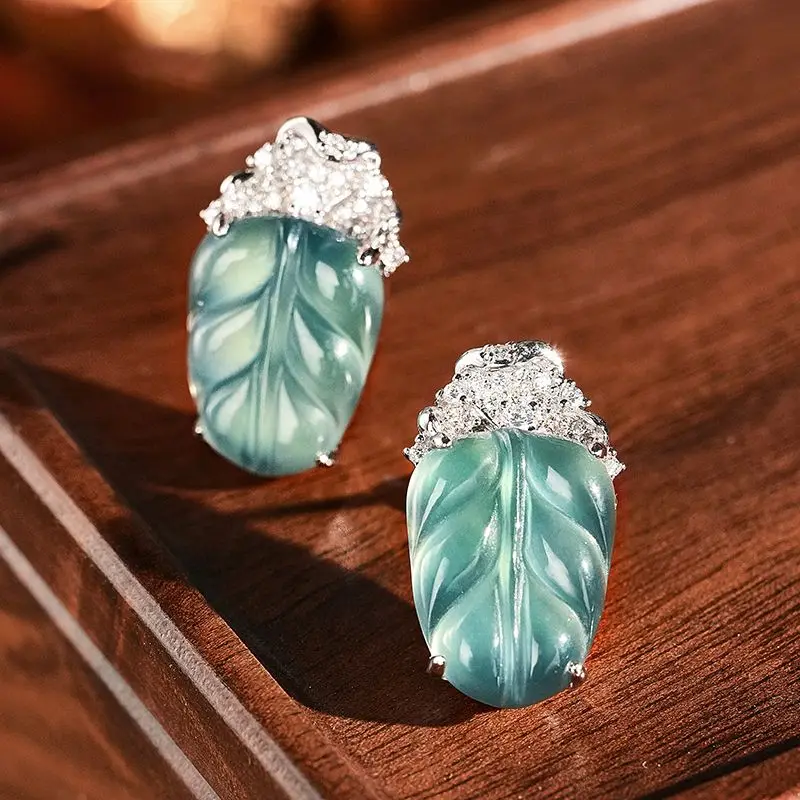 

Premium egg surface leaf earrings women's light luxury fashion earrings high cold trend versatile new products give gifts