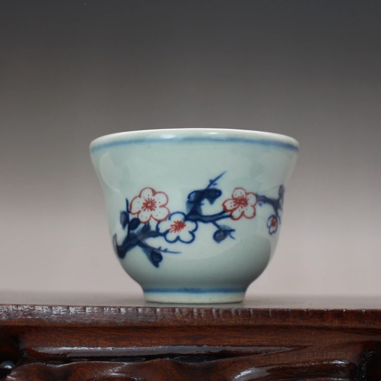 

Late Qing dynasty kiln blue and white plum pattern small tea cup single cup ceramic old goods