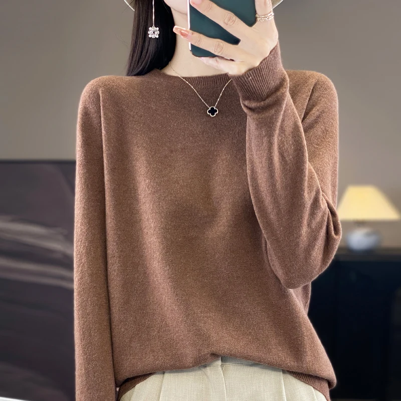 

100% pure wool sweater.Loose bottomknitted sweater.Round neck women's sweater. Fashionablesolid color versatile long sleeved top