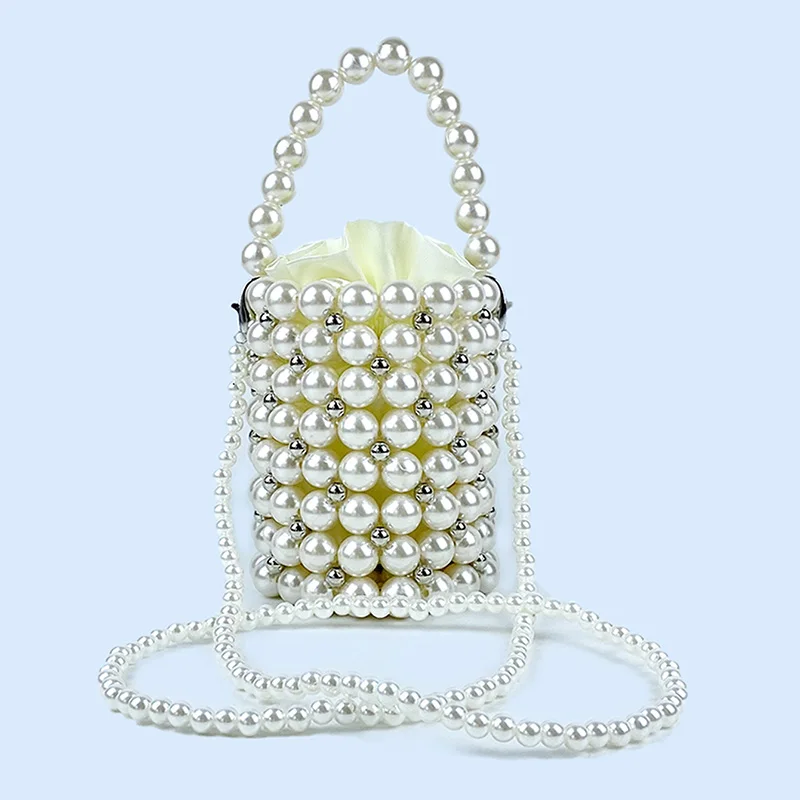 Hollow handmade woven beaded pearl bag, round bucket bag, hand-held fairy bag, paired with skirt small bag