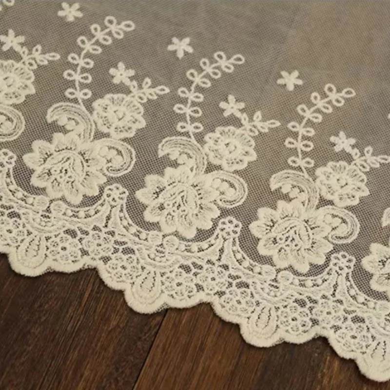 

Apricot-colored all-cotton net fabric with lace trim and embroidery accessories for wedding dresses, home textiles and bedding.