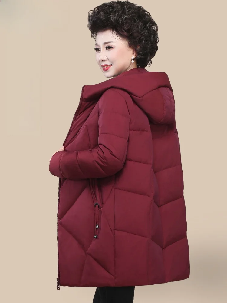 

Утепленная зимняя куртка средней длины для женщин среднего возраста: модная, свободного кроя, из полиэстера, на молнии