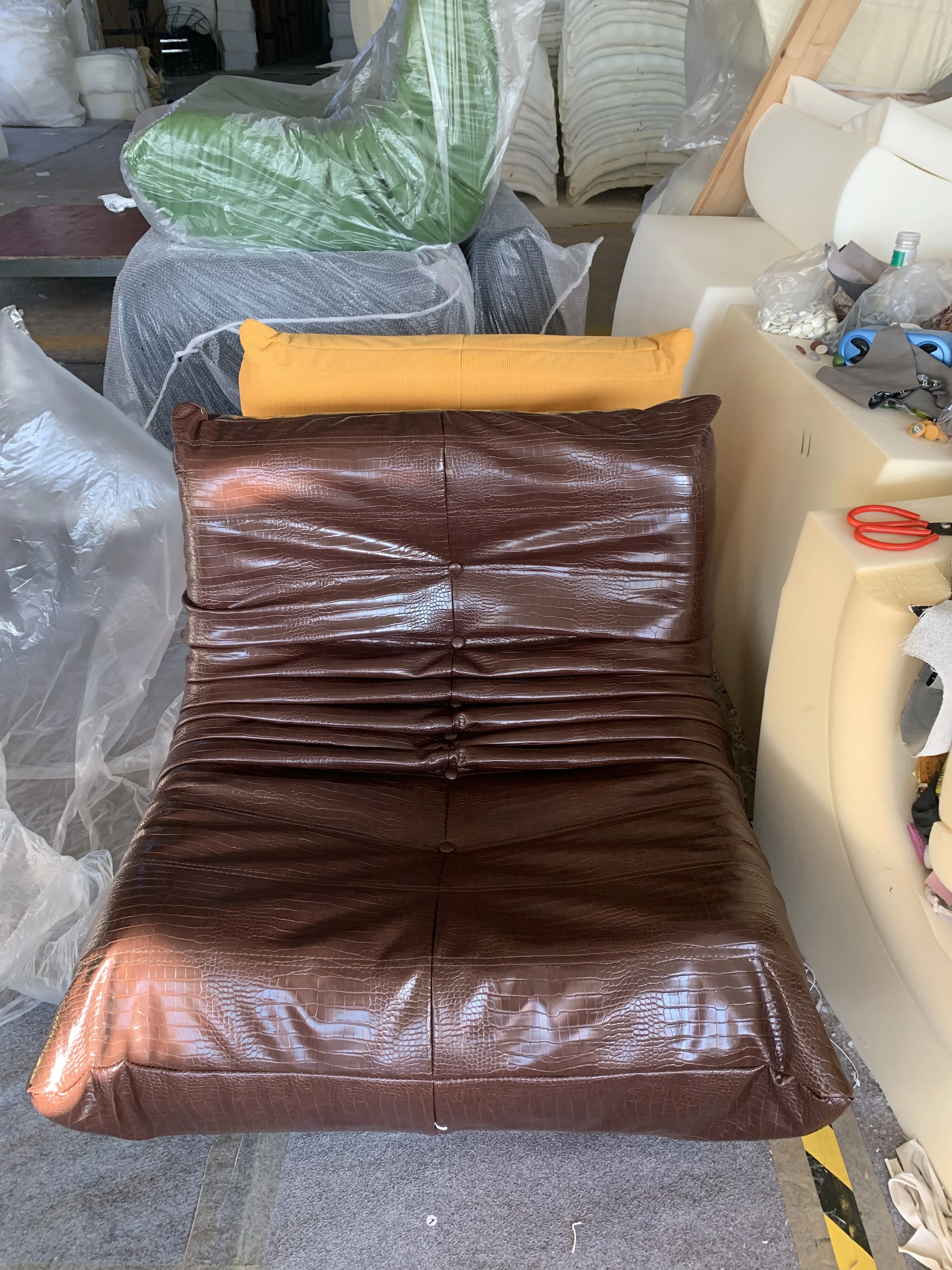 

Black brown luxurious caterpillar sofa, suitable for use in living rooms, bedrooms, shopping malls, and hotels