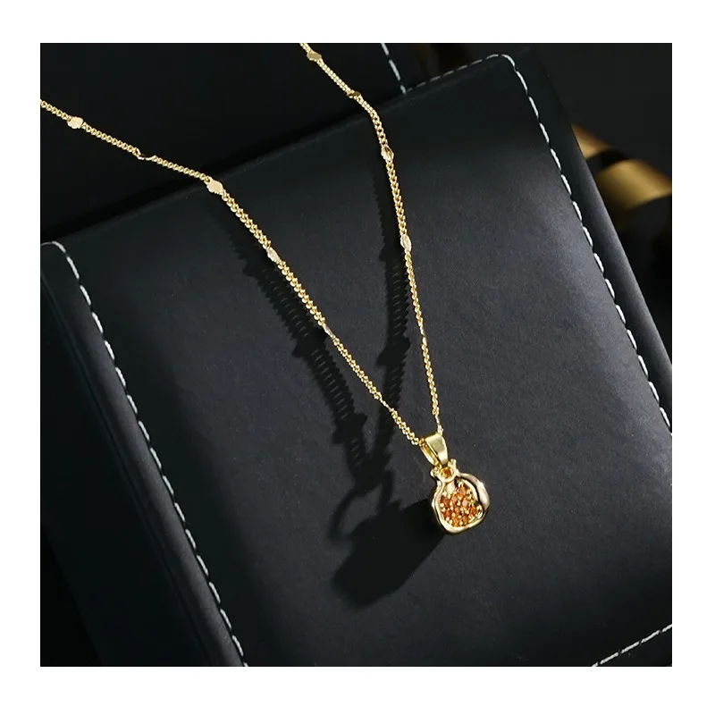 

Personalized Versatile Light Luxury Rose Red Zircon Small Exquisite Pomegranate Pendant Necklace Earrings Set Earrings