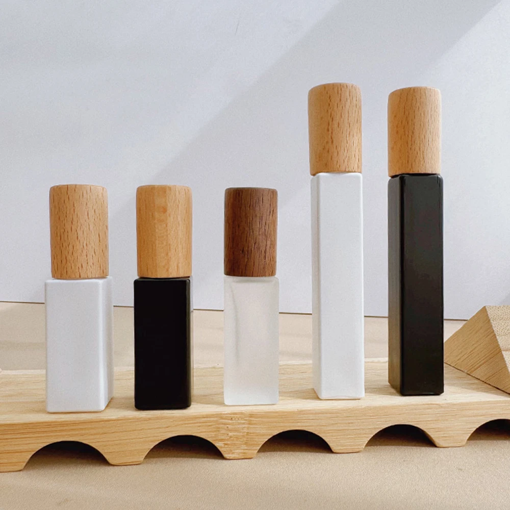 Bouchon en bois rouleau sur bouteille naturel vide rechargeable bouteille de parfum verre rouleau sur bouteilles bloquant la lumière pour huile essentielle quotidienne