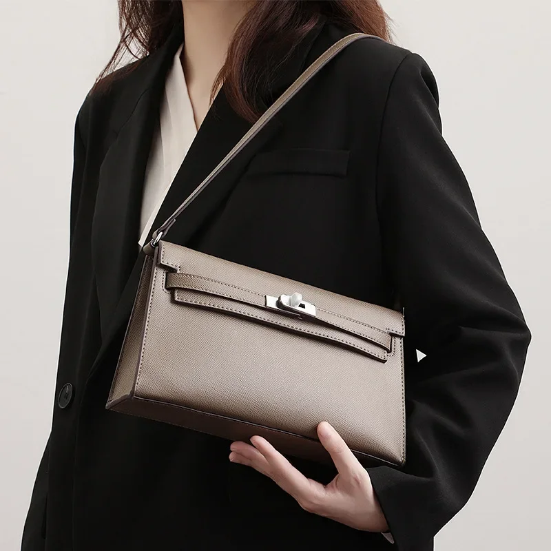 Bolso Kelly para axila de verano 2025, bolso de pan francés cruzado inclinado versátil con patrón de palma a la moda, sensación de alta gama